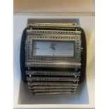 A DOLCE AND GABBANA WRIST WATCH IN A PRESENTATION BOX SEEN WORKING BUT NO WARRANTY