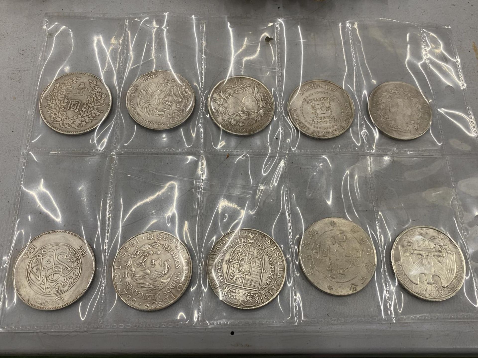 TEN COLLECTORS FOREIGN COINS TO INCLUDE AN 1865 US DOLLAR, ETC - Image 2 of 2