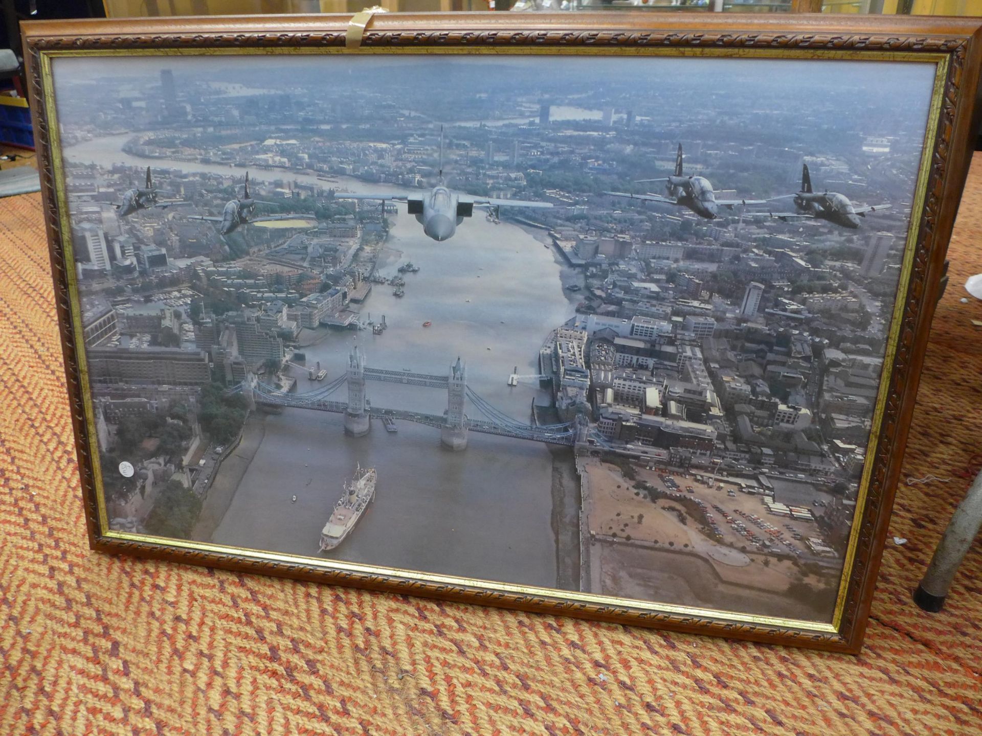 TWO LARGE PHOTOGRAPHS OF RAF PLANES FLYING OVER BUCKINGHAM PALACE AND TOWER BRIDGE, 52X81CM,