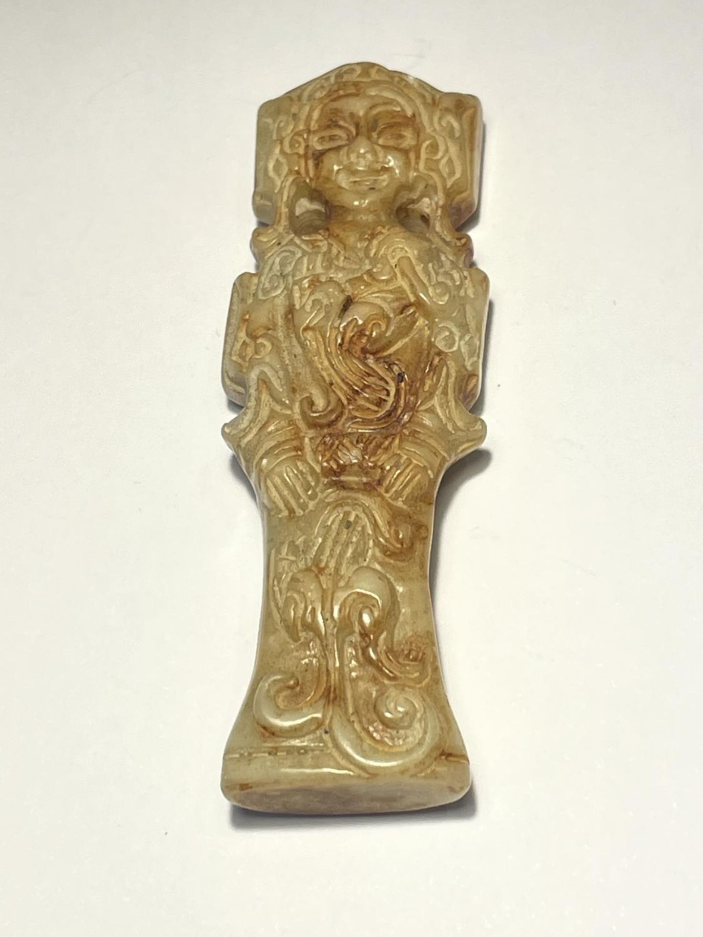 AN ORIENTAL JADE CARVING