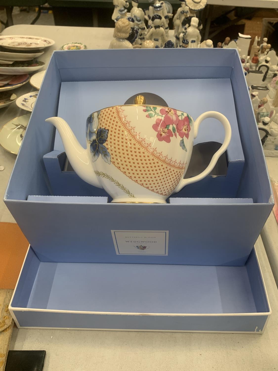 A BOXED WEDGWOOD TEAPOT BUTTERFLY BLOOM