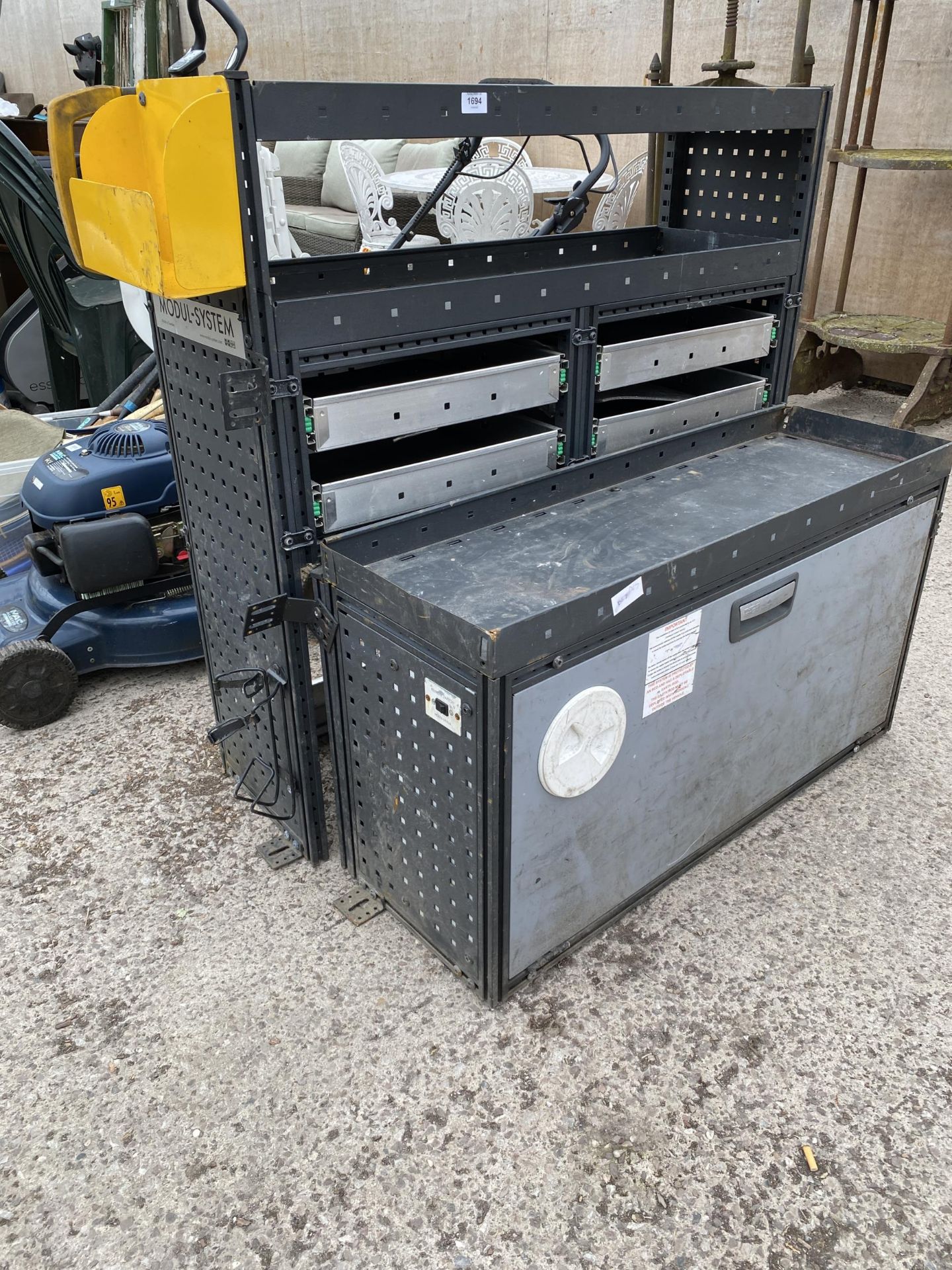 TWO SECTIONS OF METAL VAN RACKING DRAWERS