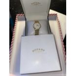 A GENTS ROTARY WRIST WATCH WITH PAPERWORK AND ORIGINAL BOX