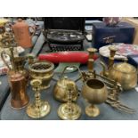 A QUANTITY OF BRASSWARE TO INCLUDE CANDLESTICKS, SMALL KETTLES, ETC