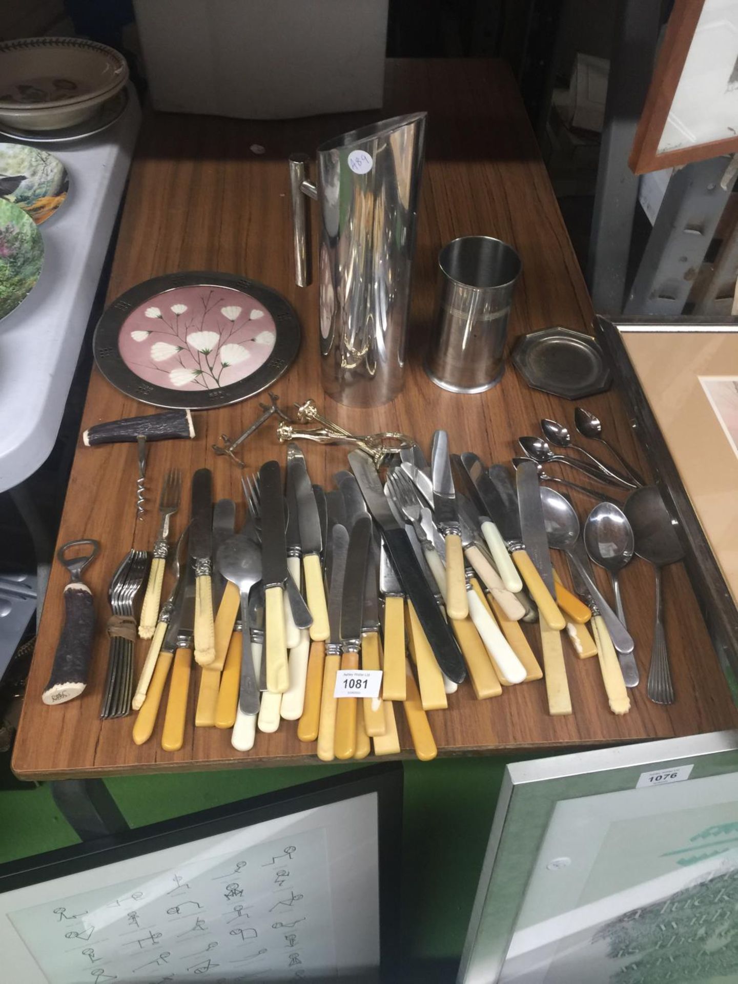 A QUANTITY OF VINTAGE FLATWARE, CORKSCREWS, STAINLESS STEEL MILK JUG, ETC