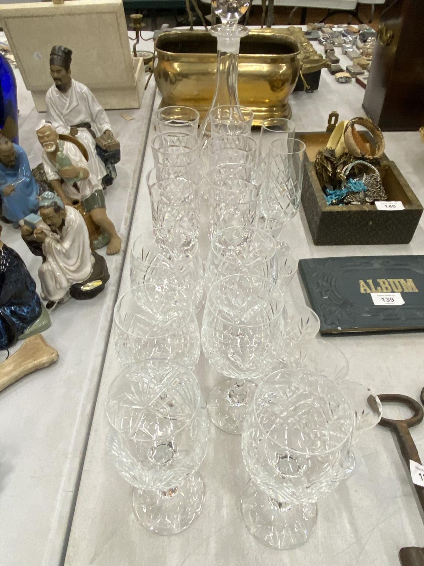 A QUANTITY OF CUT GLASS TO INCLUDE A DECANTER, WINE AND SHERRY GLASSESS, ETC