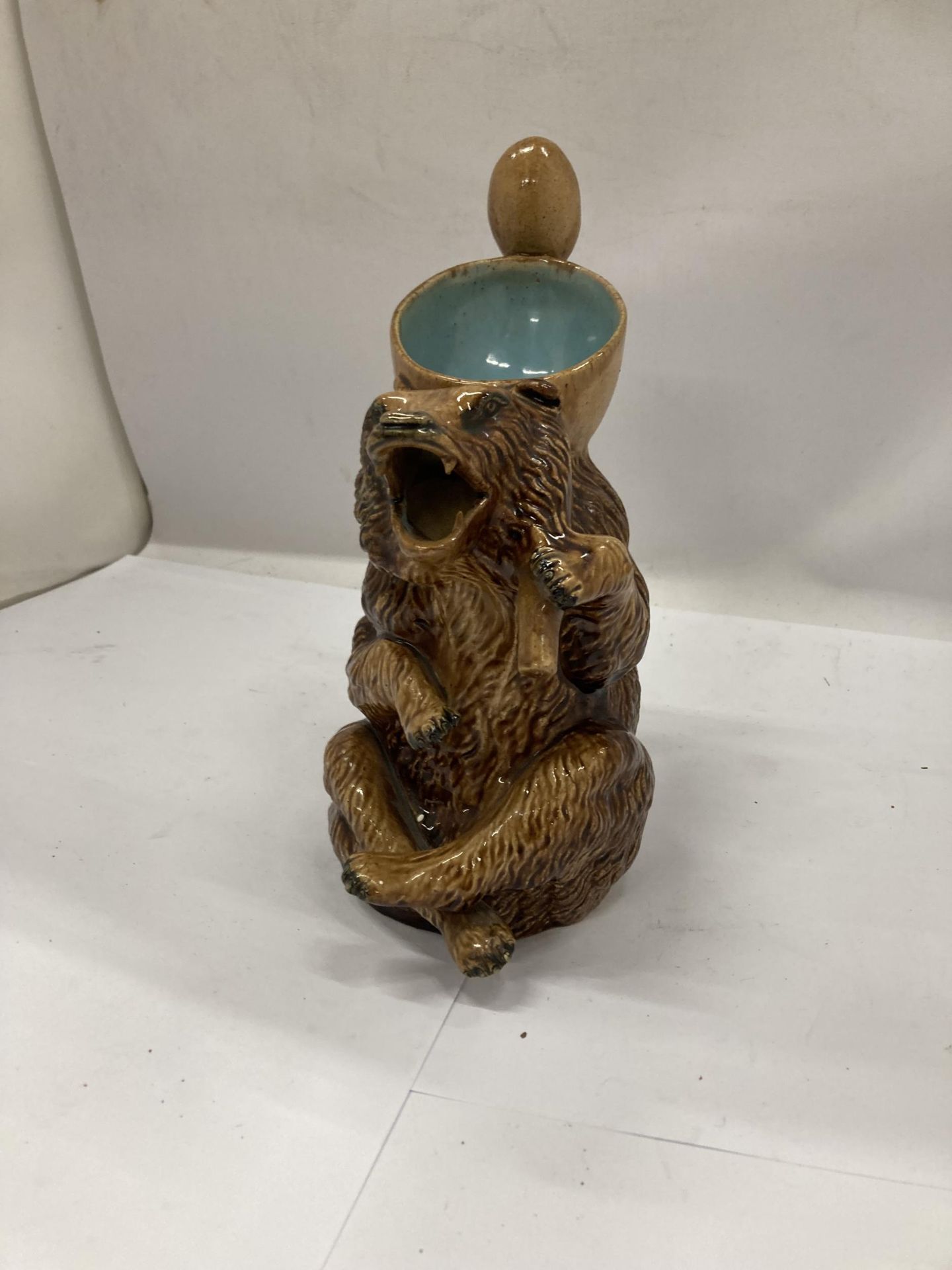 A VICTORIAN MAJOLICA BEAR JUG