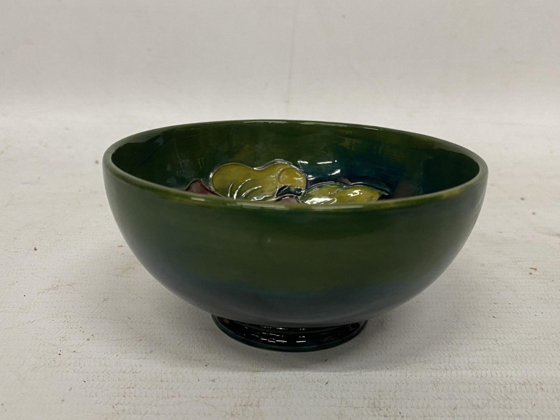 A MOORCROFT CLEMATIS BOWL ON GREEN GROUND - Image 2 of 3