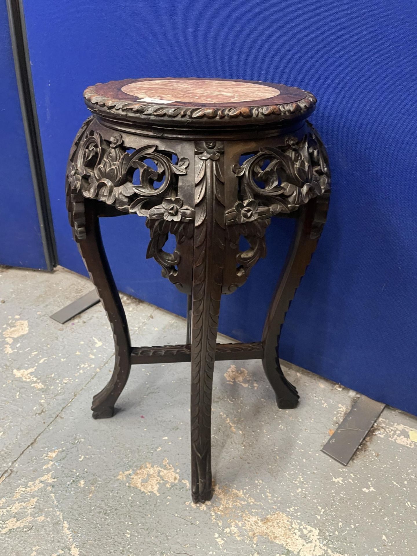 AN ANTIQUE CHINESE CARVED HARDWOOD JARDINIERE STAND WITH MARBLE INSET TOP