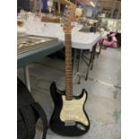 A SQUIER FENDER STRAT ELECTRIC GUITAR