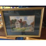 A GILT FRAMED WATERCOLOUR OF A COTTAGE, UNSIGNED