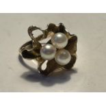 A 9CT YELLOW GOLD AND PEARL RING SIZE K, WEIGHT 4.44 GRAMS