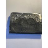 A VINTAGE MARKED 925 SILVER AND LEATHER PURSE