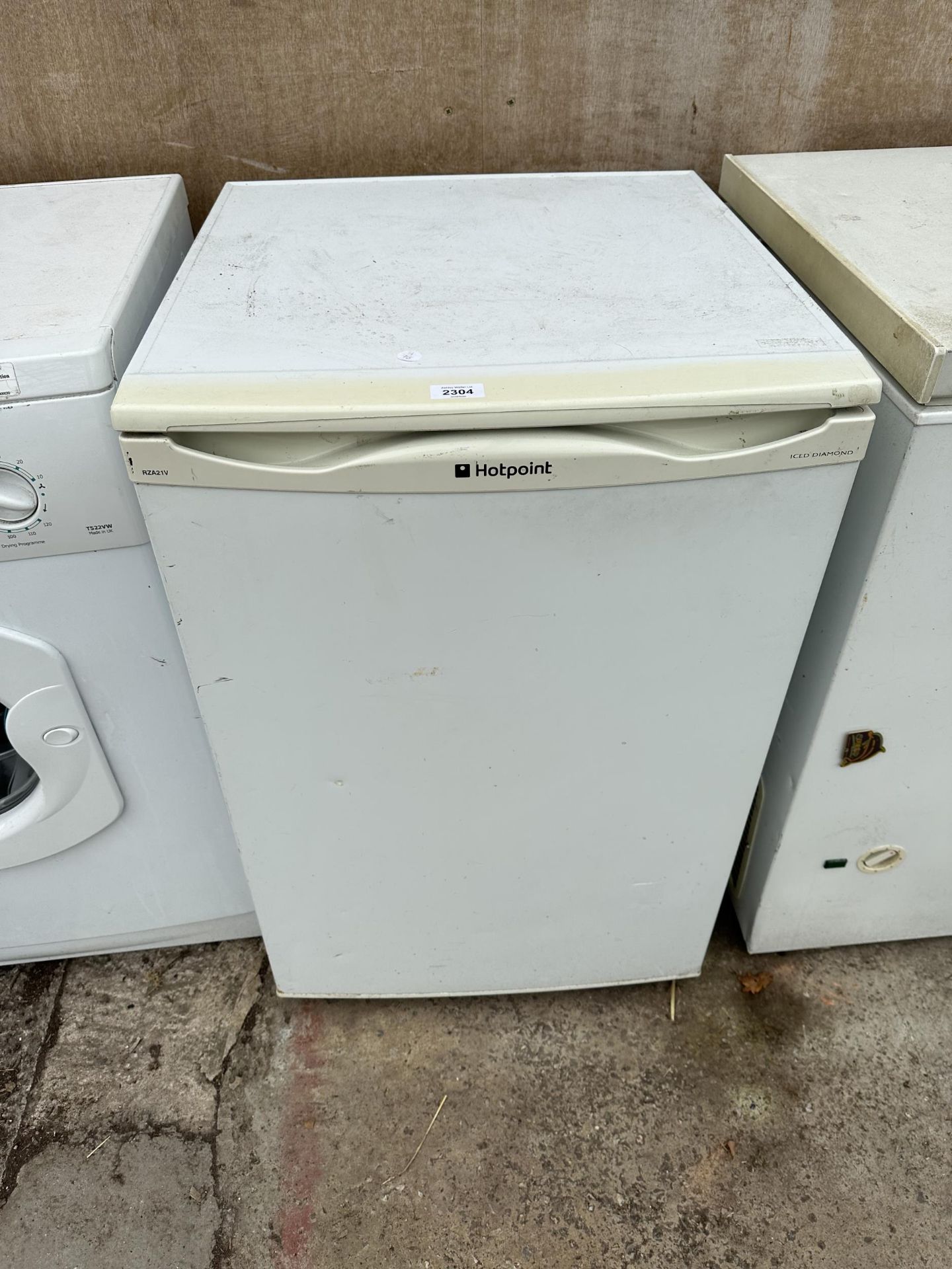 A WHITE HOTPOINT UNDERCOUNTER FREEZER