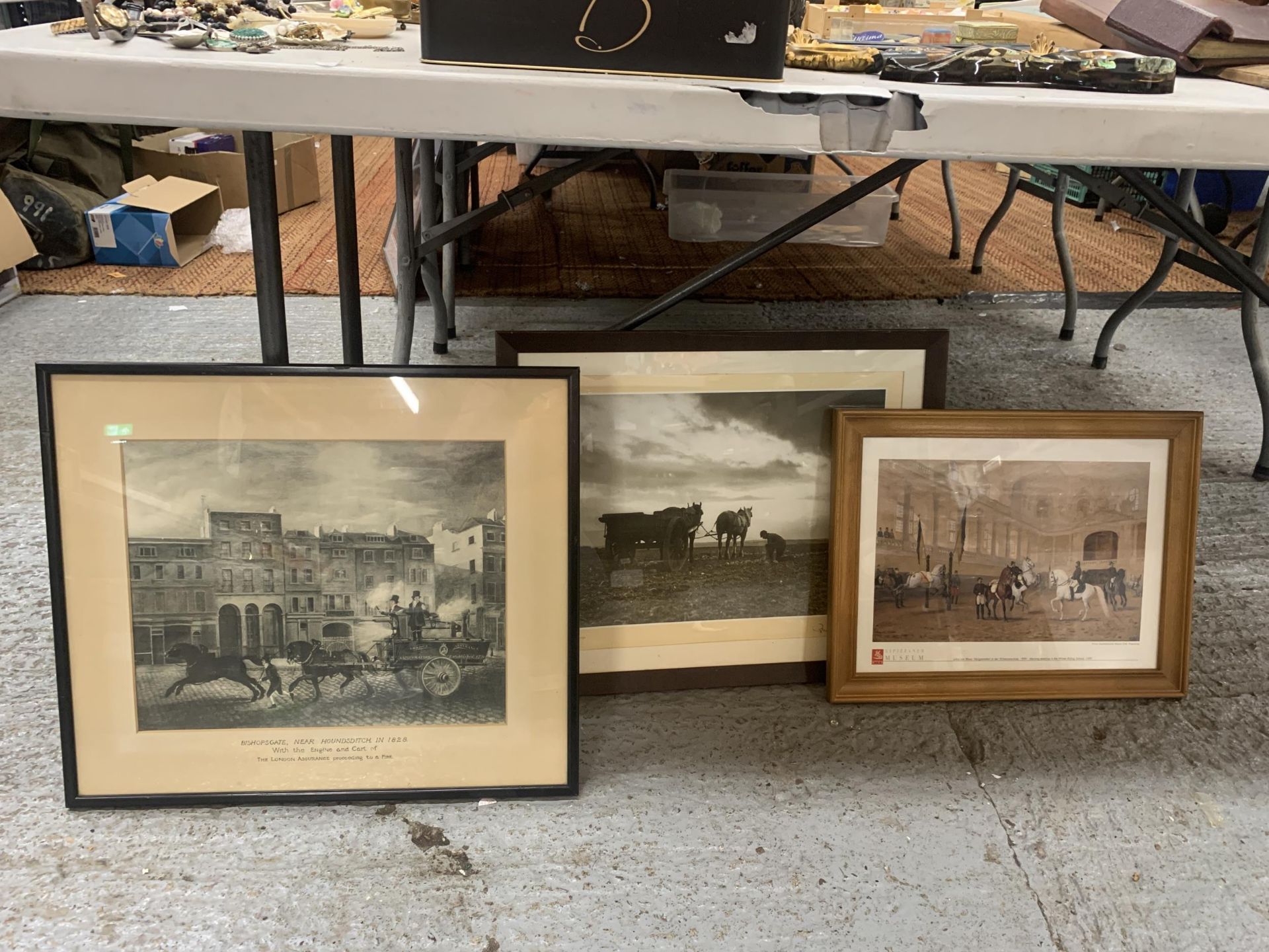 A GROUP OF THREE FRAMED HORSE RELATED PRINTS