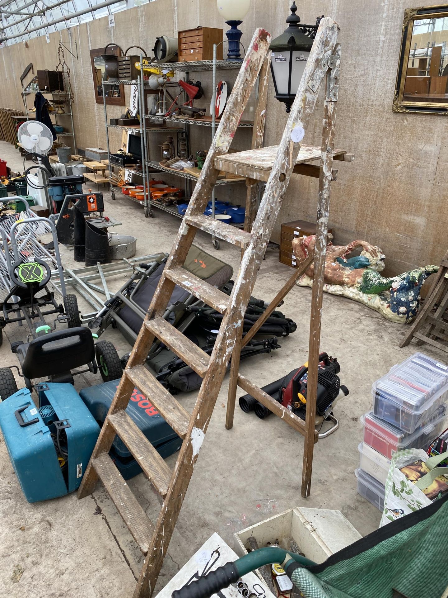 A VINTAGE SIX RUNG WOODEN STEP LADDER