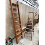 A WOODEN NINE RUNG LADDER AND A VINTAGE FIVE RUNG WOODEN STEP LADDER