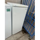 A WHITE HAIER UPRIGHT FRIDGE