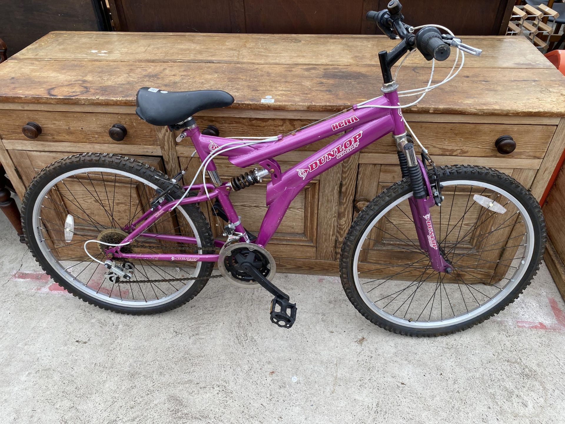 A LADIES DUNLOP HERA MOUNTAIN BIKE WITH FRONT AND REAR SUSPENSION AND 15 SPEED GEAR SYSTEM