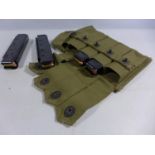 AN UNITED STATES MID 20TH CENTURY MILITARY CANVAS MAGAZINE POUCH WITH FOUR MAGAZINES WITH TEN