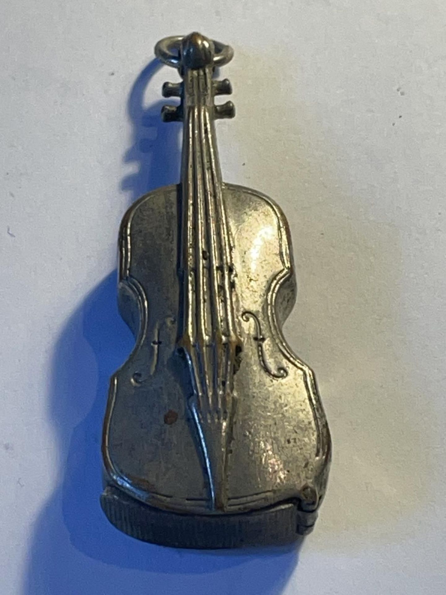 A VESTA CASE IN THE STYLE OF A VIOLIN