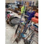 AN ASSORTMENT OF TOOLS TO INCLUDE STEP LADDERS, FORKS AND SPADES ETC