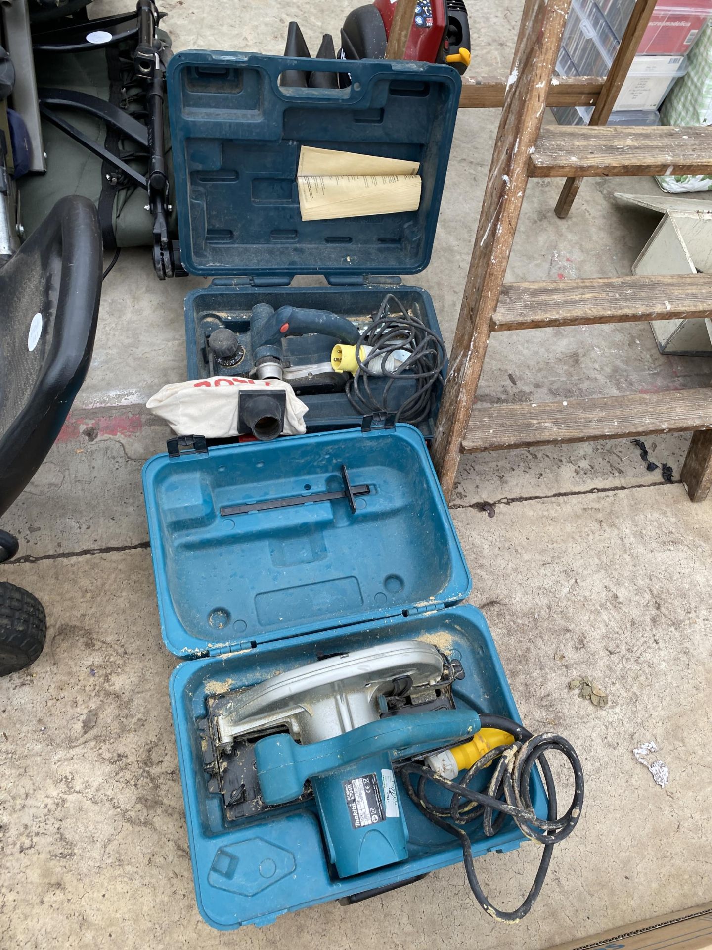 A BOSCH ELECTRIC WOOD PLANE AND A MAKITA 110V RIP SAW