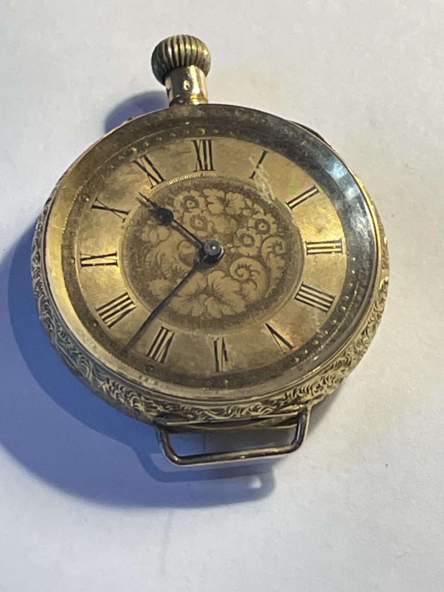 A 14CT GOLD LADIES OPEN FACED POCKET WATCH GROSS WEIGHT 32.37 GRAMS