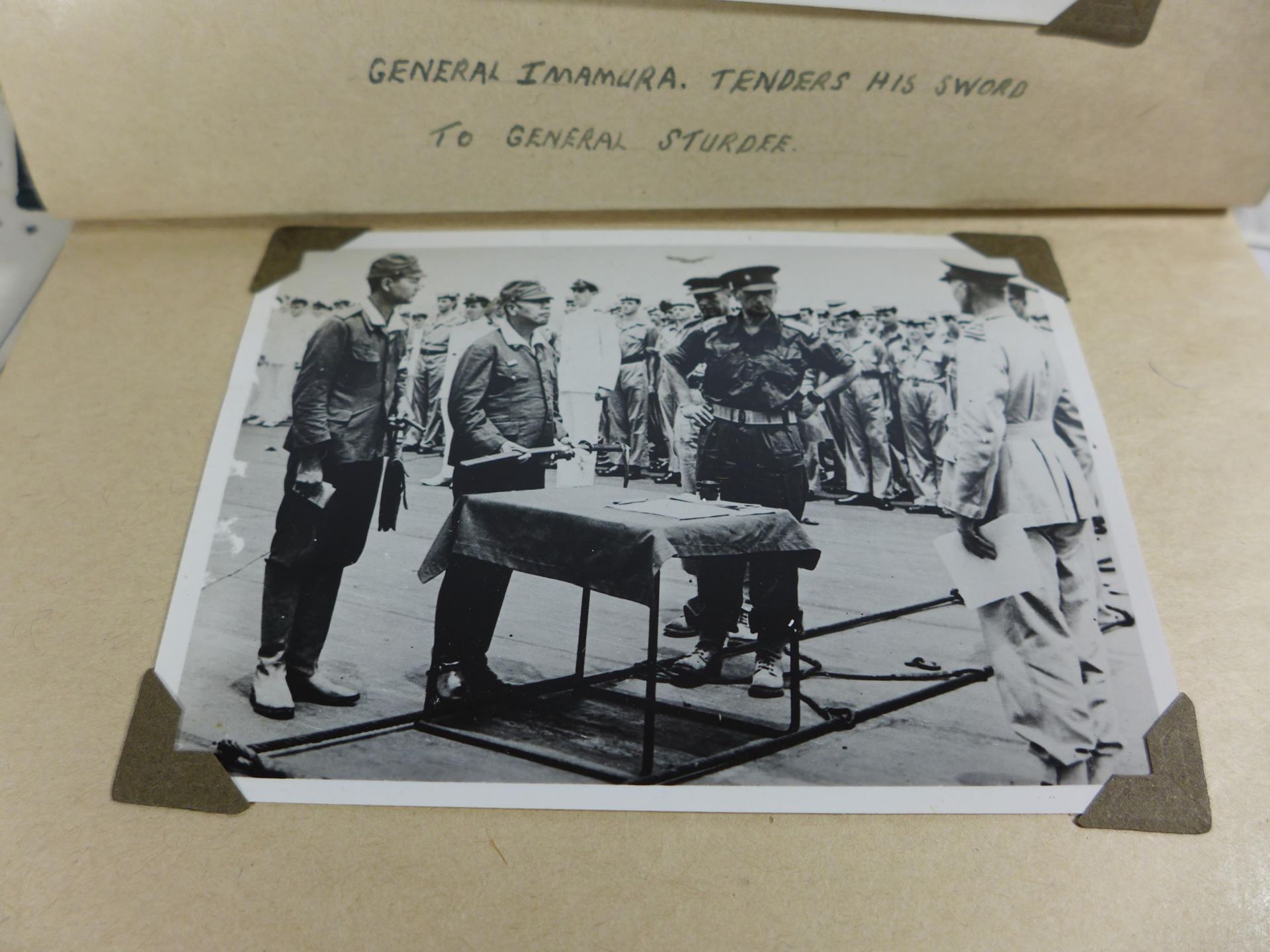 A WORLD WAR II PHOTOGRAPH ALBUM CONTAINING PHOTOGRAPHS OF THE JAPANESE SIGNING OF THE INSTRUMENT - Image 2 of 9