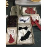 A COLLECTION OF VINTAGE TEDDY TAILORING COMPANY BOXED DOLLS CLOTHES