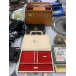 THREE VINTAGE LEATHER BOXES TO INCLUDE A VANITY TRAVELLING CASE, MANICURE SET AND A JEWELLERY BOX,