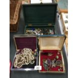 A LARGE QUANTITY OF COSTUME JEWELLERY TO INCLUDE BROOCHES, NECKLACES, EARRINGS, ETC.,