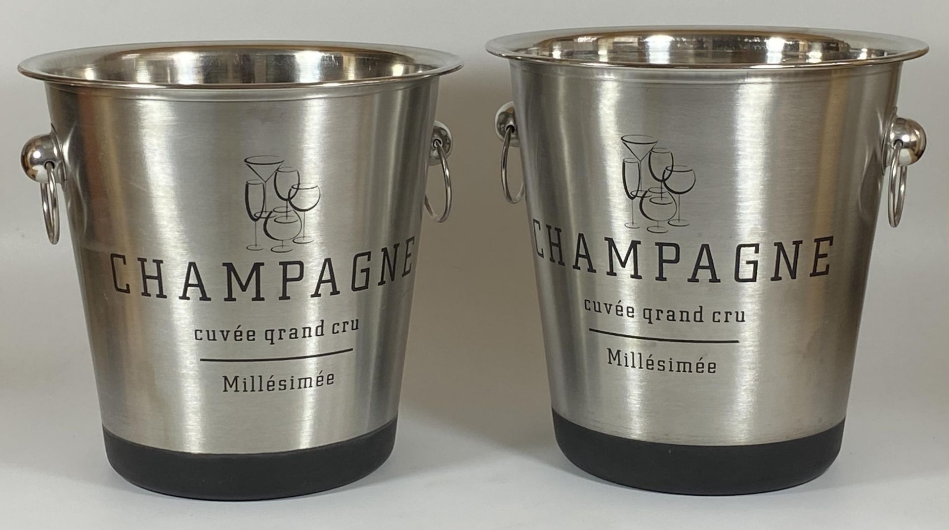 A PAIR OF CHROME EFFECT CHAMPAGNE BUCKETS