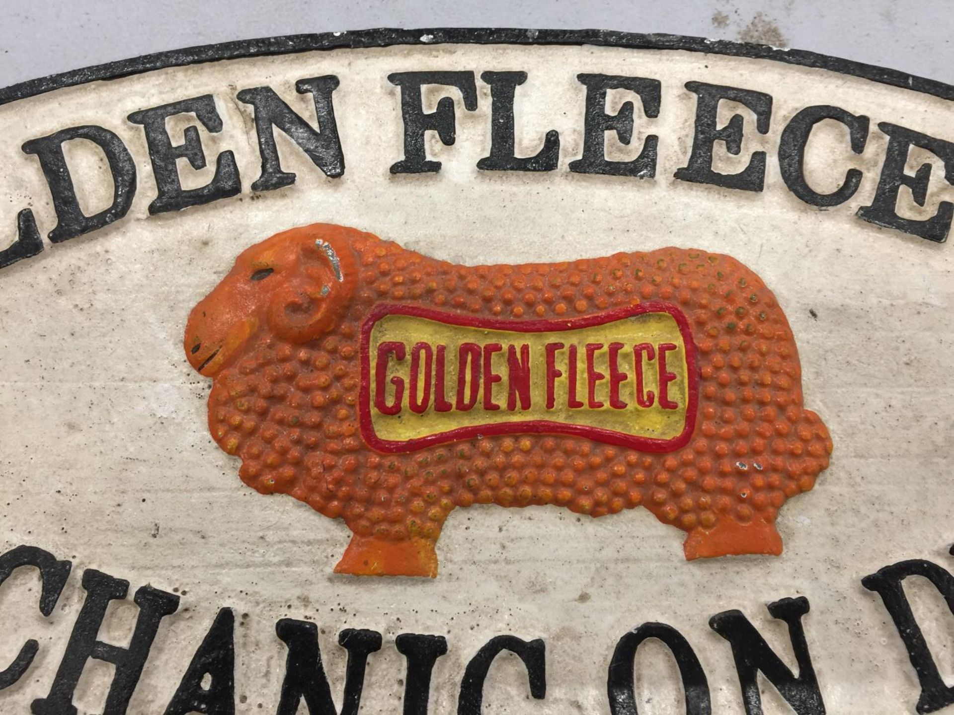 A CAST METAL SIGN GOLDEN FLEECE OIL MECHANIC ON DUTY - Image 2 of 2