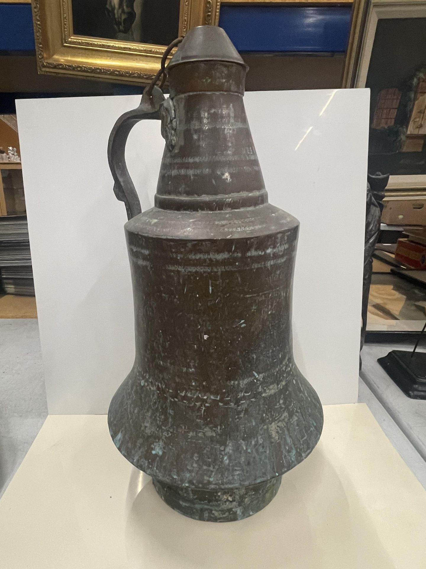 A LARGE MIDDLE EASTERN COPPER DRINKING VESSEL - INSCRIBED 'MEHMET' TO TOP