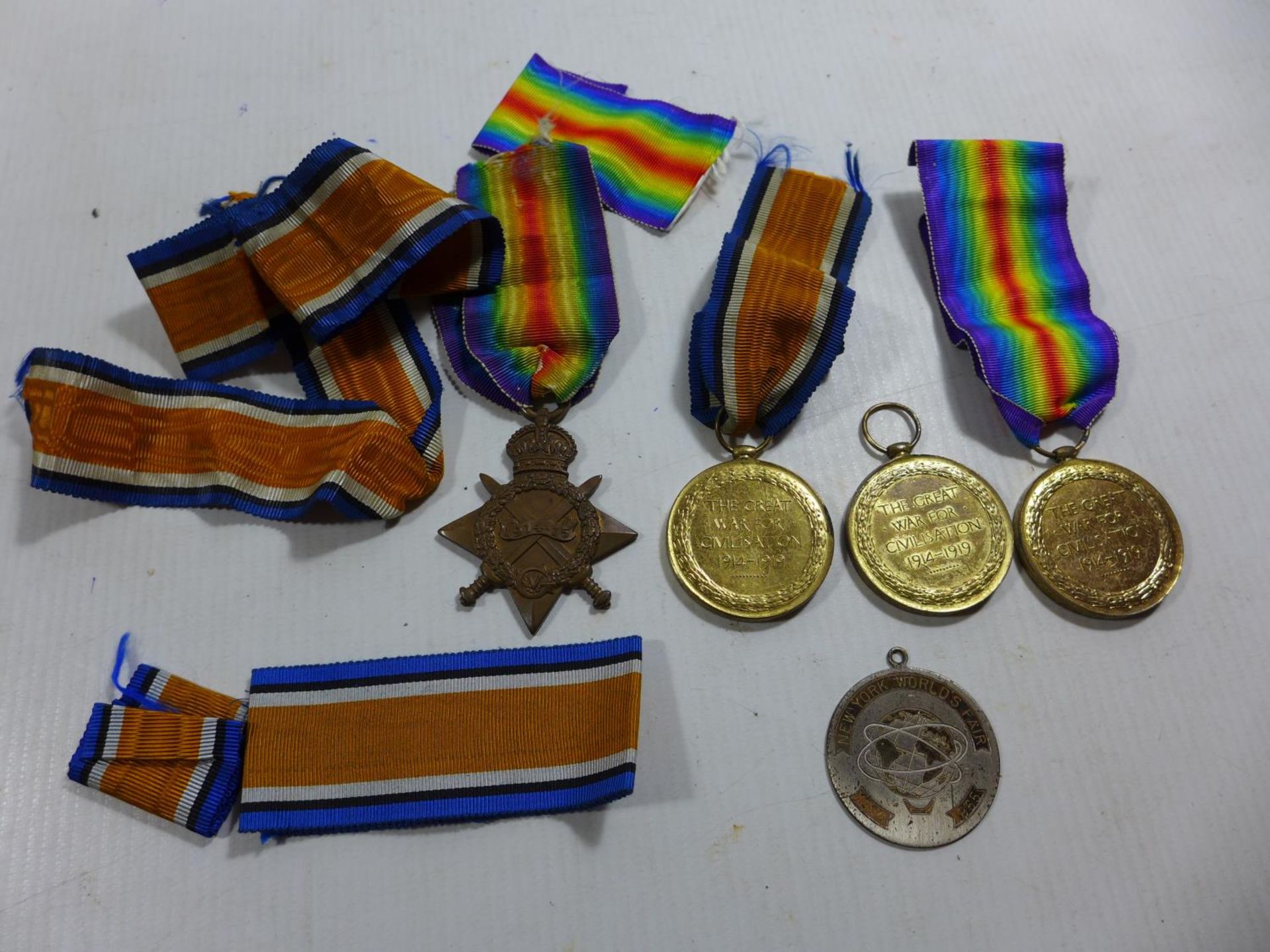 A WORLD WAR I 1914-15 STAR AWARDED TO TS.2731 J.GREIG TR ROYAL NAVY RESERVE, THREE WAR FOR