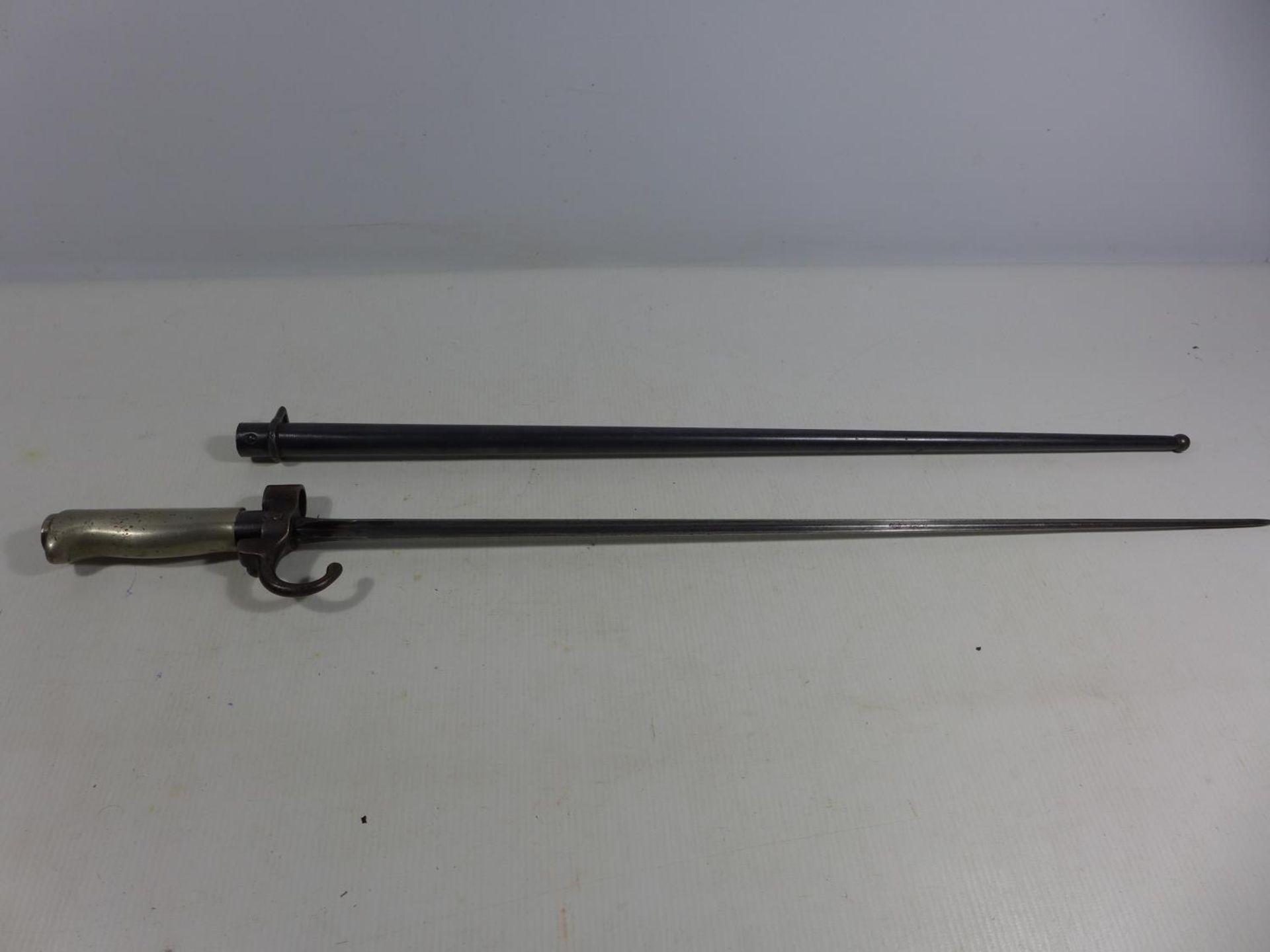 A FRENCH LEBEL BAYONET AND SCABBARD, 51.5CM BLADE