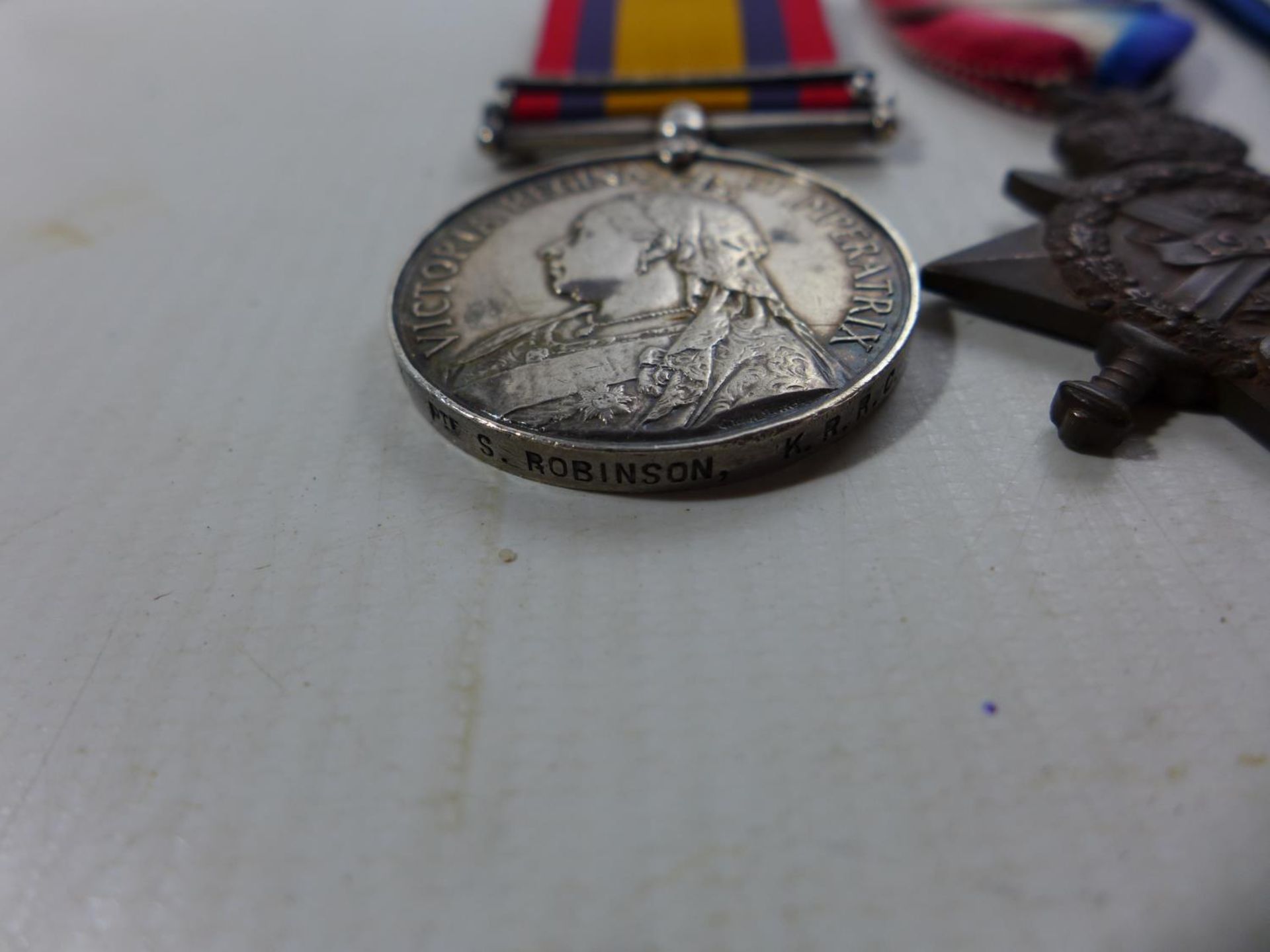 A BOER WAR AND WORLD WAR I CASUALTY MEDAL GROUP AWARDED TO 1653 PRIVATE SIMEON ROBINSON OF THE KINGS - Image 3 of 5