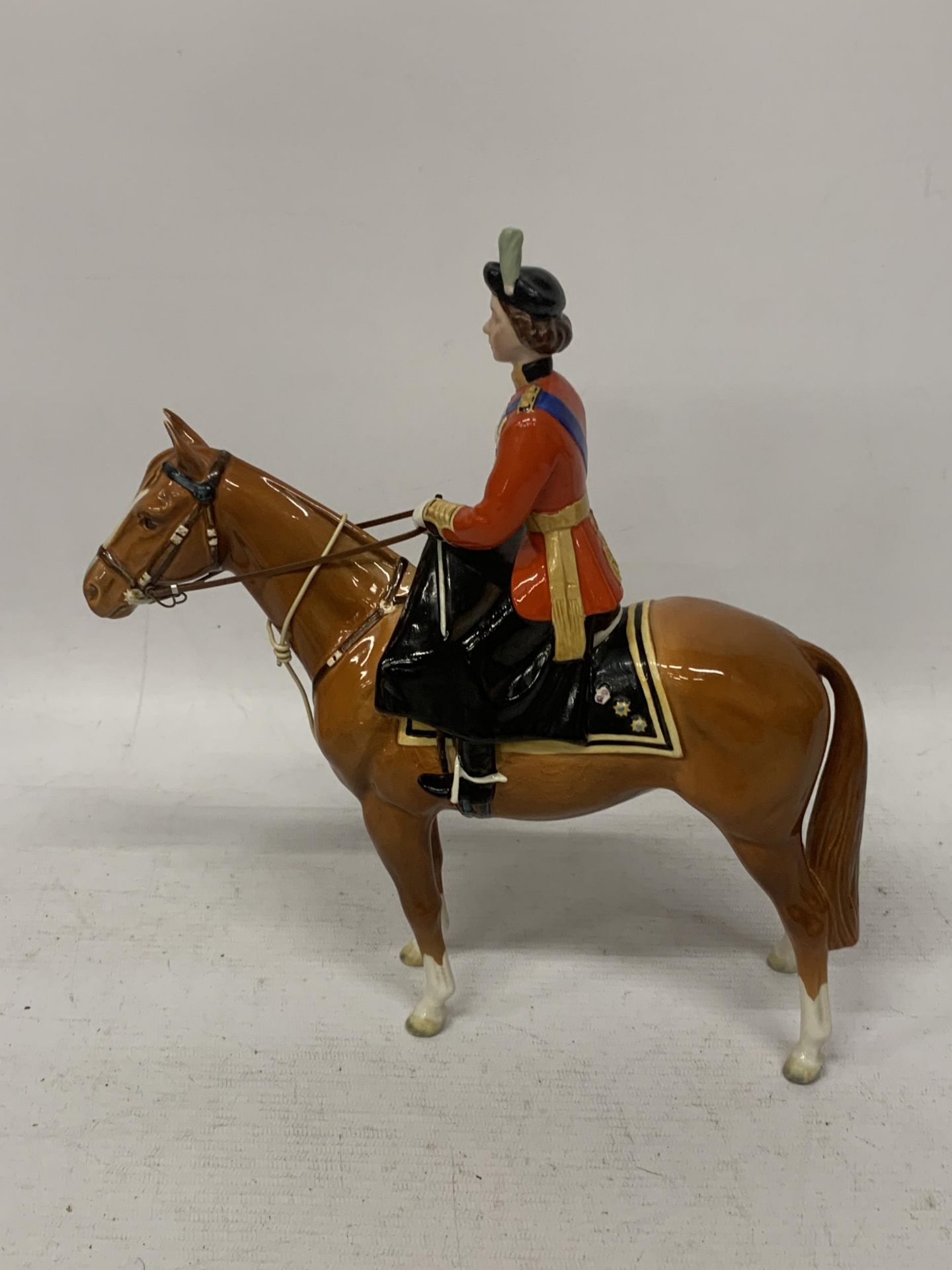 A BESWICK QUEEN ELIZABETH II ON IMPERIAL TROOPING THE COLOUR 1957 NO.1546