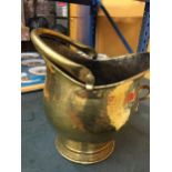 A VINTAGE BRASS COAL BUCKET WITH SWING HANDLE
