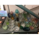 A VERY LARGE QUANTITY OF COLOURED AND CLEAR GLASSWARE TO INCLUDE DESSERT DISHES, AVOCADO BOWLS,