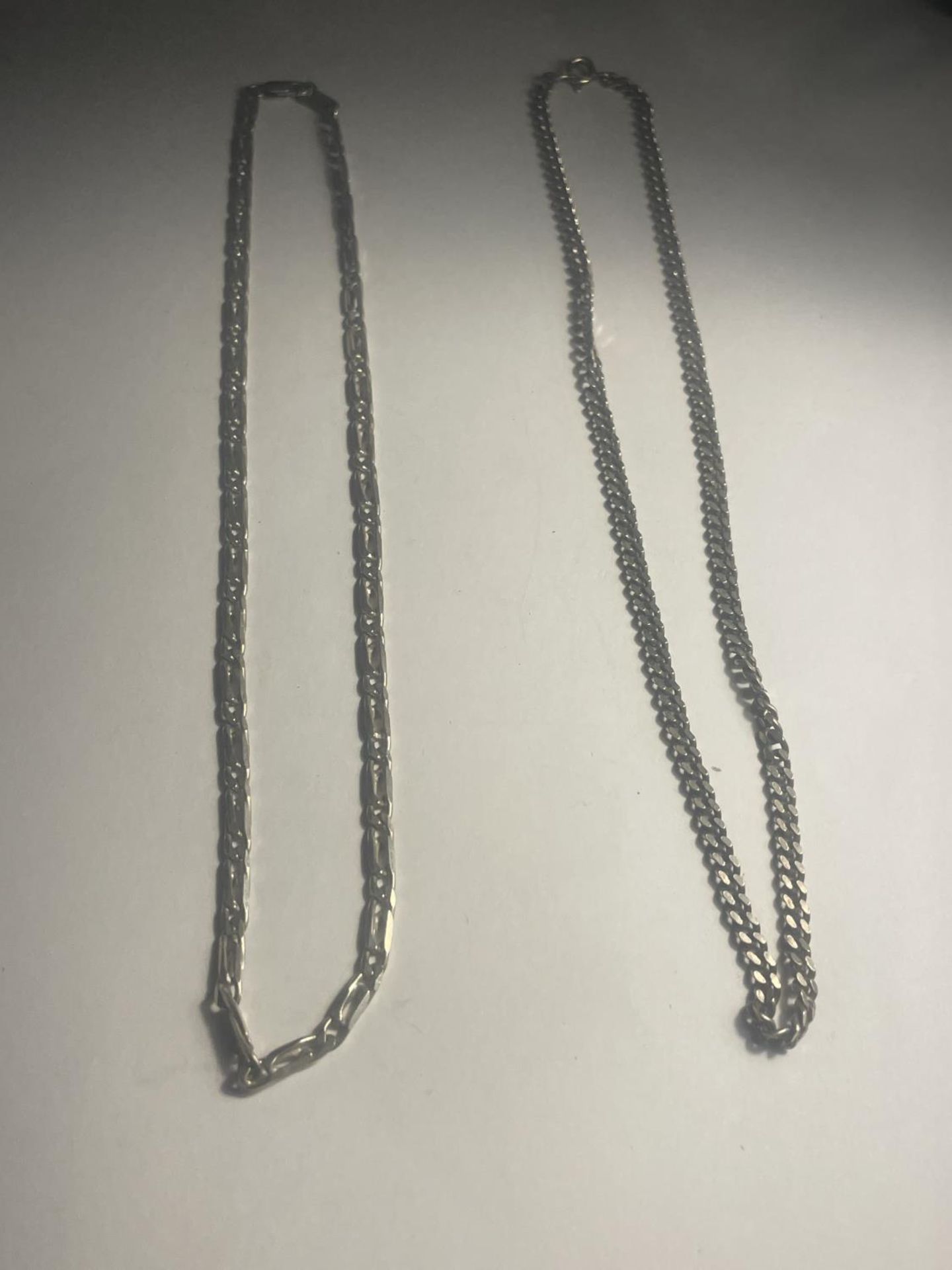 TWO SILVER NECKLACES