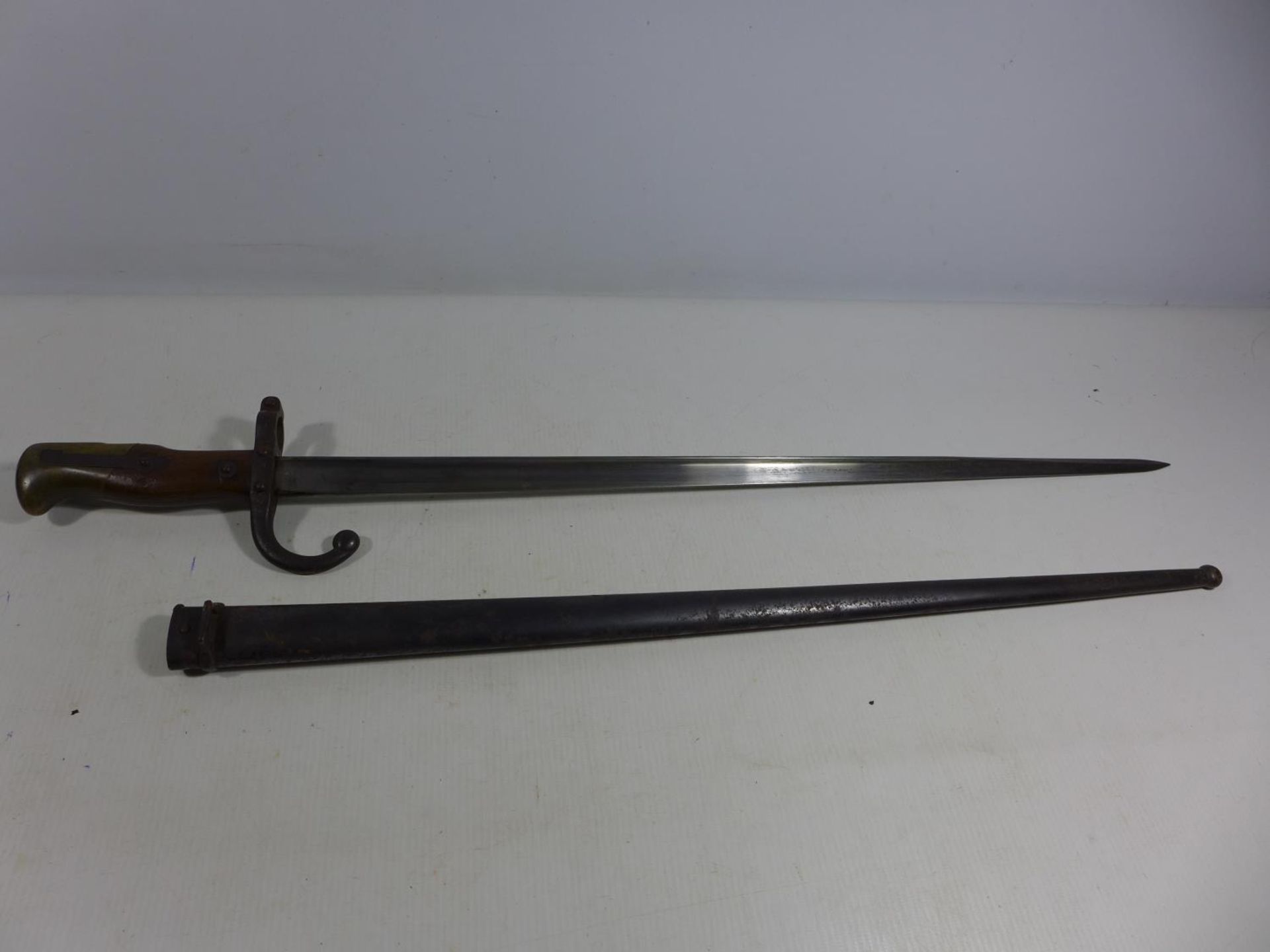 A FRENCH GRAS BAYONET AND SCABBARD DATED 1882, 52CM BLADE