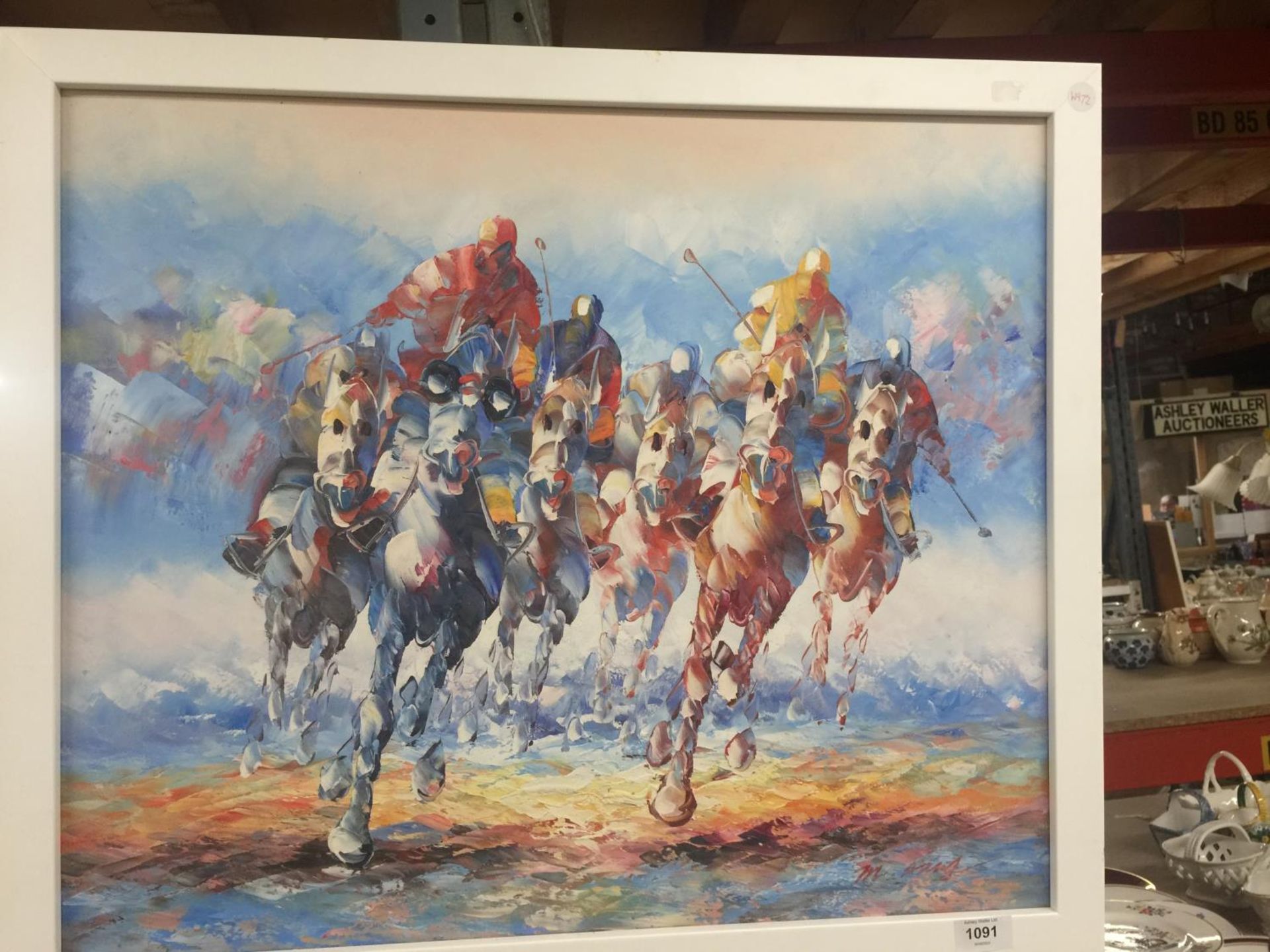 A LARGE OIL ON BOARD OF A HORSE RACE, 57CM X 67CM