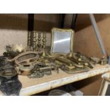 A VERY LARGE QUANTITY OF BRASS TO INCLUDE CANDLESTICKS, A PICTURE FRAME, PAN STAND, KEY RACK, ETC.,