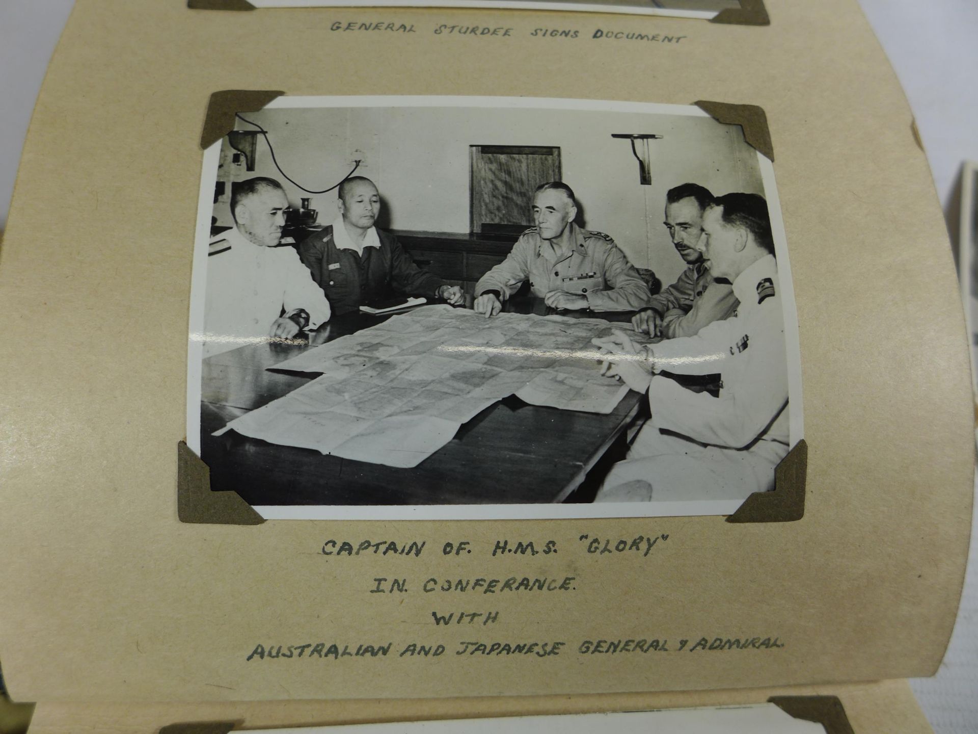 A WORLD WAR II PHOTOGRAPH ALBUM CONTAINING PHOTOGRAPHS OF THE JAPANESE SIGNING OF THE INSTRUMENT - Image 5 of 9