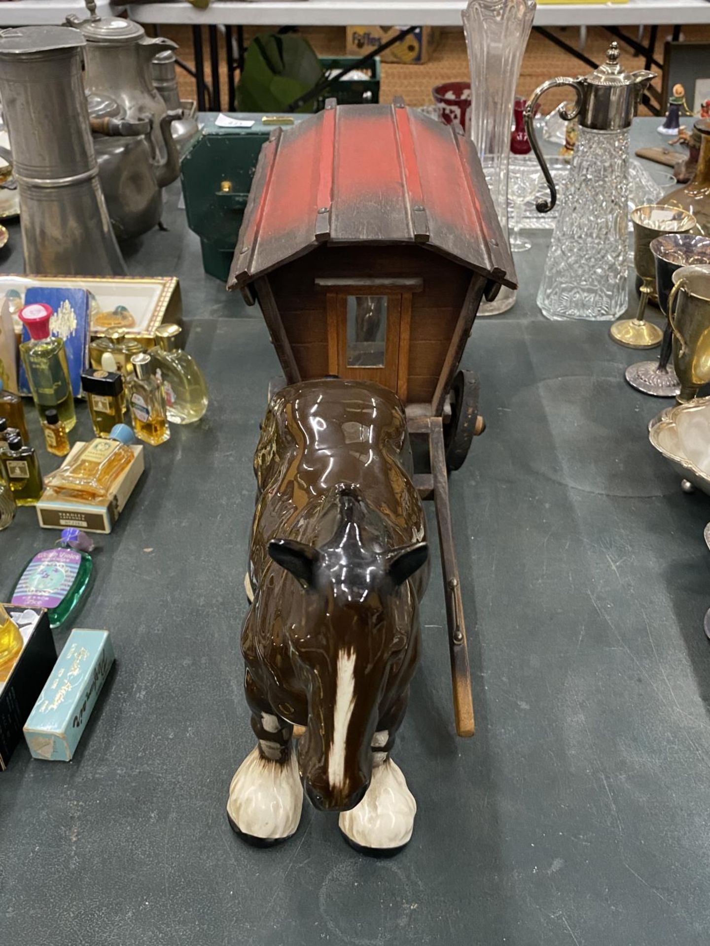 A WOODEN ROMANY CARAVAN WITH A MELBA WARE SHIRE HORSE