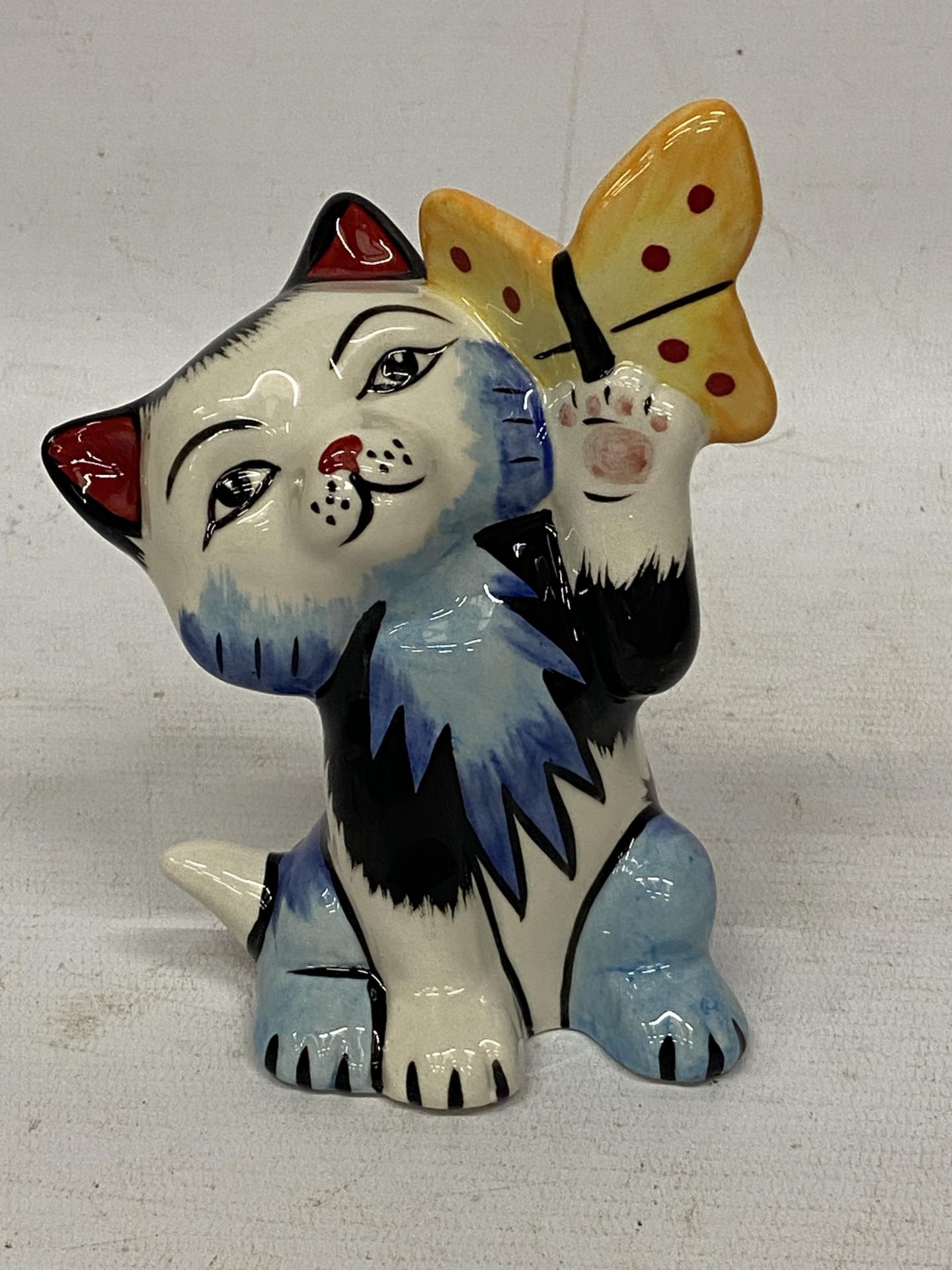 A LORNA BAILEY BUTTERFLY CAT FIGURE