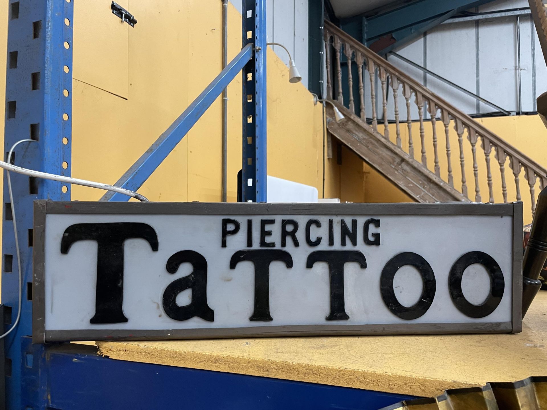 A PIERCING TATTOO ILLUMINATED BOX SIGN