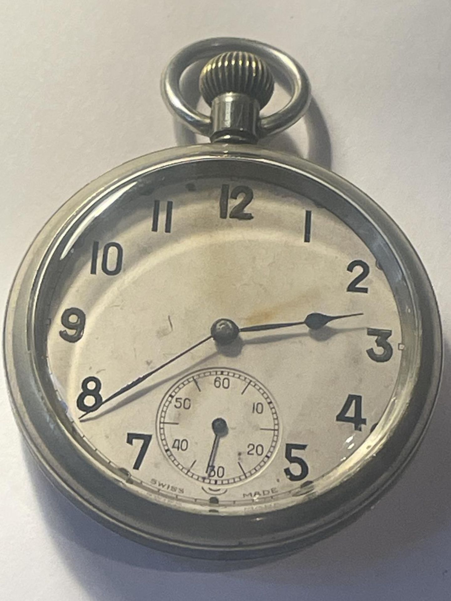 A MILITARY POCKET WATCH WITH CROWS FOOT SEEN WORKING BUT NO WARRANTY